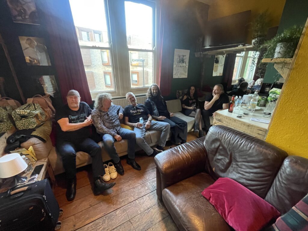 Deeper Purple band members relaxing backstage before the show at The Brook Southampton