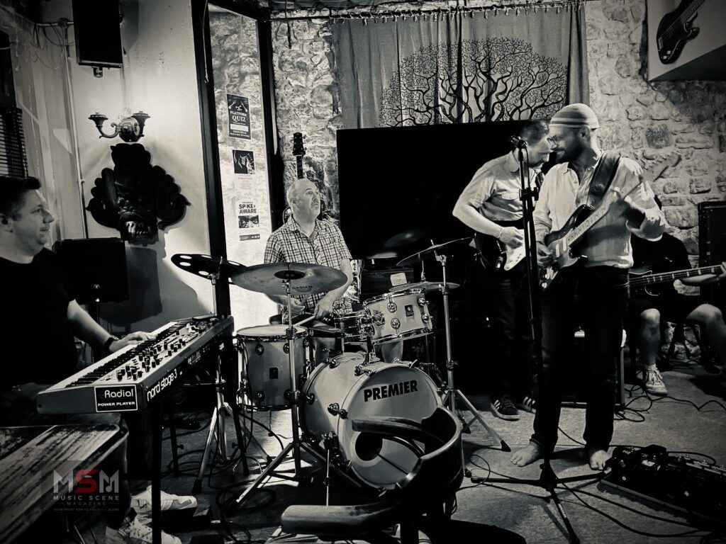 Black and white live band rehearsal performance in intimate venue for MSM “So You Wanna Build A Band” feature
