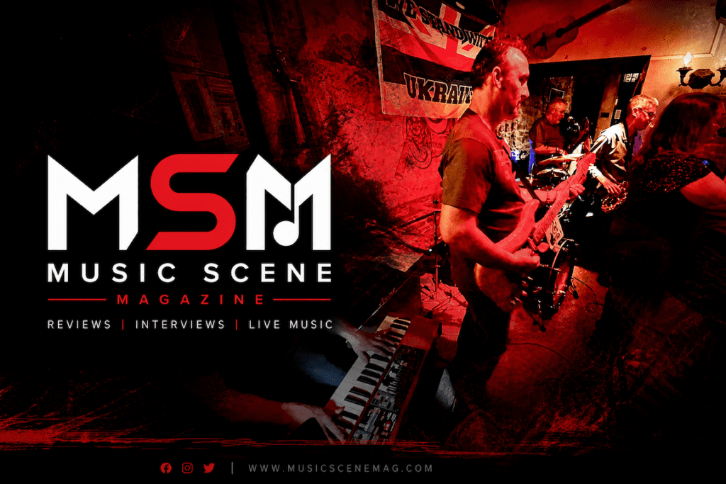 MSM Music Scene Magazine live performance promotional image with guitarist under red stage lighting