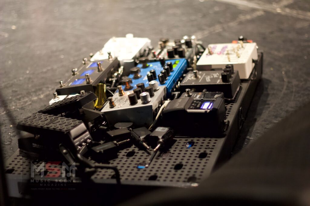 Pedalboard setup on stage at the Wedgewood Rooms during the Speaking In Tongues live performance in Portsmouth.