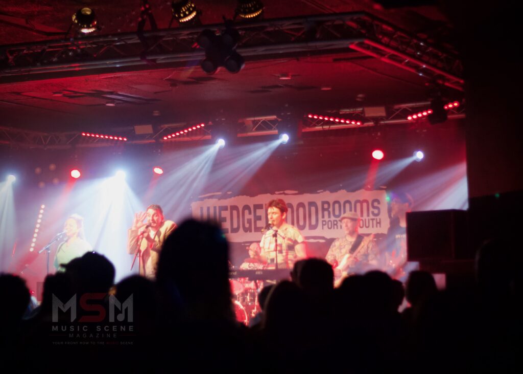 Speaking In Tongues stage lighting and crowd atmosphere at live show.