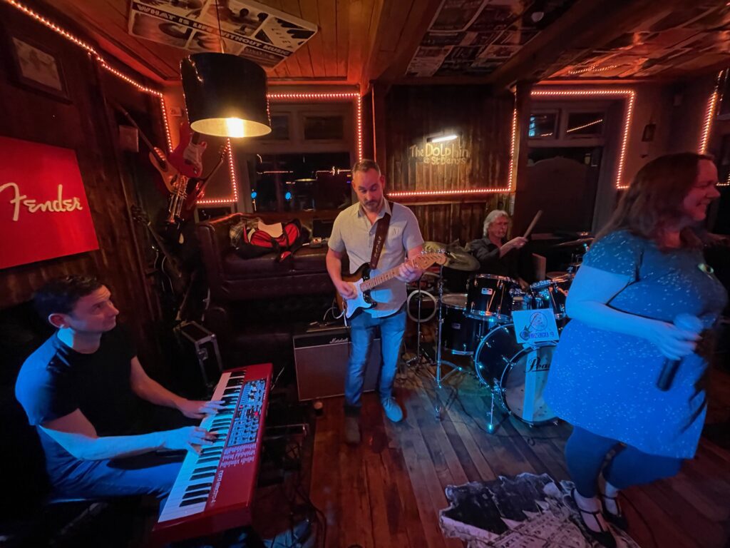 Chicago 9 performing live at The Dolphin, St Denys, Southampton, with keyboard player Jim Mitchell and the full band during a live rhythm and blues performance.